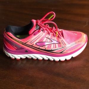 Running Shoes. Worn maybe once. No tears.